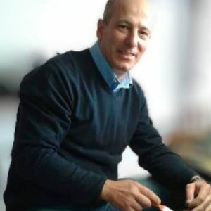 Corretor - Renato Caria